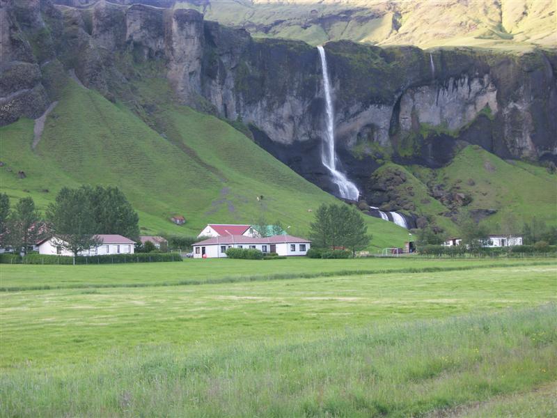 Iceland One of many waterfalls along the coastal route.jpg
